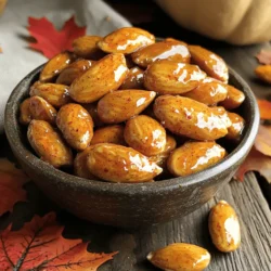 To make Pumpkin Pie Spiced Almonds, you will need the following ingredients: - 2 cups raw almonds - 2 tablespoons coconut oil, melted - 3 tablespoons brown sugar (or coconut sugar) - 1 teaspoon pumpkin pie spice - 1/2 teaspoon sea salt - 1/4 teaspoon cayenne pepper (optional) - 1 teaspoon vanilla extract These ingredients blend perfectly to create a warm, sweet, and slightly spicy snack. The raw almonds serve as a healthy base, while the coconut oil adds richness. Brown sugar brings a sweet touch, and pumpkin pie spice gives that cozy fall flavor. A hint of cayenne pepper adds a kick, but feel free to skip it if you prefer no heat. Vanilla extract rounds out the flavor beautifully, making each bite delightful. For the complete recipe and instructions, check out the Full Recipe. - Preheat your oven to 350°F (175°C). Line a baking sheet with parchment paper. - In a large bowl, mix the melted coconut oil, brown sugar, pumpkin pie spice, sea salt, cayenne pepper (if using), and vanilla extract. Stir until it's smooth and well combined. - Add the raw almonds to the bowl. Stir gently until each almond gets coated evenly with the spiced mixture. Make sure no almond is left uncoated. - Spread the coated almonds in a single layer on the prepared baking sheet. - Bake in the oven for 15 to 20 minutes. Stir them halfway through to help them roast evenly. Keep an eye on them. Nuts can go from perfect to burnt quickly. - Check for doneness by looking for a golden color and a nice aroma. When they smell good and look golden, they are ready. - Remove the almonds from the oven and let them cool on the baking sheet for about 10 minutes. They will harden as they cool. - Once cooled, break apart any clusters. Transfer the spiced almonds to an airtight container for storage. - For the full recipe, you can refer to the earlier section. To avoid burning the nuts, keep a close watch on them while baking. Nuts can go from golden to burnt in a flash. Set a timer for 15 minutes, but check them sooner. Stirring halfway through the baking time is key. This helps the almonds roast evenly. It also allows all sides to get that nice golden color. Don’t skip this step! These pumpkin pie spiced almonds are great for snacking. You can enjoy them straight from the bowl. They also make a fun topping for salads or oatmeal. Try mixing them into trail mix. They add a tasty crunch and a seasonal twist. Pair them with a warm drink for a cozy treat! You can experiment with spices to make them your own. Consider adding a dash of cinnamon or nutmeg for extra warmth. A sprinkle of ginger can also add a nice kick. If you want heat, try more cayenne or a pinch of chili powder. Each twist brings a new flavor to the table. Have fun with it! {{image_2}} You can switch raw almonds for other nuts. Cashews, walnuts, or pecans work great. Each nut brings its own taste and texture. For a richer flavor, try using hazelnuts. Remember, different nuts might roast at different rates. Keep an eye on them while baking. Brown sugar is tasty, but there are other choices. Coconut sugar adds a nice caramel note. Honey or maple syrup can also work. For a sugar-free option, use stevia or monk fruit. These sweeteners can help you enjoy a healthier snack without losing flavor. You can spice things up by adding chocolate. Melt dark chocolate and mix it with the almonds. For a fruity twist, toss in some dried cranberries or cherries. You can also sprinkle some cinnamon or nutmeg for extra warmth. Experiment with flavors to find your perfect mix. To keep your pumpkin pie spiced almonds fresh, store them in an airtight container. This helps prevent moisture from ruining the crunch. I recommend using glass jars or food storage bags. Keep the container in a cool, dry place away from sunlight. Avoid the pantry if it gets warm, as heat can spoil the nuts quickly. When stored properly, pumpkin pie spiced almonds can last up to two weeks. After this time, they might lose their crunch and flavor. If you want the best taste, eat them within the first week. This ensures you enjoy their full flavor and crunchiness. You can freeze pumpkin pie spiced almonds for longer storage. To do this, place them in a freezer-safe bag. Squeeze out as much air as possible before sealing. When you want to enjoy them again, simply take out the amount you need. Let them thaw at room temperature for about 30 minutes. This keeps them crunchy and delicious. To make pumpkin pie spiced almonds, follow these steps: 1. Preheat your oven to 350°F (175°C) and line a baking sheet with parchment paper. 2. In a large bowl, mix melted coconut oil, brown sugar, pumpkin pie spice, sea salt, cayenne pepper, and vanilla extract until smooth. 3. Add the raw almonds and stir until they are fully coated. 4. Spread the almonds in a single layer on the baking sheet. 5. Bake for 15-20 minutes, stirring halfway to ensure even roasting. Keep a close eye to prevent burning. 6. Once golden, remove them from the oven and let them cool for 10 minutes. The almonds will harden as they cool. 7. Break apart any clusters and store in an airtight container. You can find pumpkin pie spiced almonds at many grocery stores. Look in the snack aisle or health food section. Online options are also great. Websites like Amazon and specialty food stores often sell them. Yes, you can! Make them a few days in advance. Just store them in an airtight container at room temperature. This keeps them fresh and crunchy. If you need an oil alternative, use vegetable oil or melted butter. Both work well and give a nice flavor. You can also try olive oil for a different taste. To make this recipe nut-free, you can use pumpkin seeds or sunflower seeds. They will still taste great with the pumpkin pie spices. Just follow the same steps in the recipe for a fun twist. In this article, we covered how to make delicious pumpkin pie spiced almonds. You learned about the key ingredients, step-by-step instructions, and helpful tips. Remember to pay attention while baking to avoid burning and to explore different nut and flavor options. These almonds make a great snack or gift. Storing them properly keeps them fresh for longer. Enjoy experimenting with this easy recipe, and make it your own!
