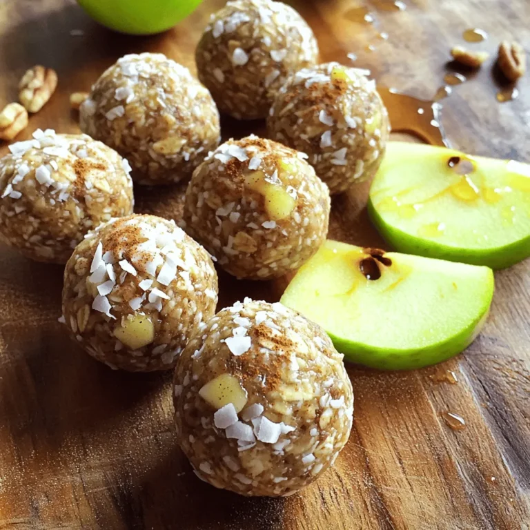 To make Cinnamon Apple Energy Balls, gather these simple items: - 1 cup rolled oats - 1/2 cup almond butter (or any nut butter) - 1/2 cup unsweetened applesauce - 1/3 cup honey or maple syrup - 1 teaspoon cinnamon - 1/4 teaspoon nutmeg - 1/2 cup chopped nuts (walnuts, pecans, or almonds) - 1/4 cup mini dark chocolate chips (optional) - 1/4 cup shredded coconut (unsweetened) Using good ingredients makes these energy balls taste great. Look for: - Rolled oats: Choose whole grain oats. They give a nice texture. - Nut butter: Go for natural nut butters. They are healthier and tastier. - Applesauce: Use unsweetened applesauce for better flavor control. - Honey or maple syrup: Choose pure honey or real maple syrup. They add a nice sweetness. If you have dietary needs, you can easily swap some ingredients: - Nut butter: Use sunflower seed butter for nut-free options. - Sweeteners: Agave syrup can replace honey or maple syrup. - Oats: Gluten-free oats work well if you need to avoid gluten. - Add-ins: Use seeds or dried fruits instead of nuts or chocolate chips. Feel free to explore these options to make the energy balls your own! For the full recipe, check the details above. Making Cinnamon Apple Energy Balls is easy and fun. You need a few simple steps. First, gather all your ingredients. Make sure you have everything ready. This way, you’ll have a smooth cooking time. Trust me, it helps a lot! 1. In a large mixing bowl, add the rolled oats, cinnamon, and nutmeg. Mix them well. This ensures the spices spread evenly. 2. In another bowl, combine almond butter, applesauce, and honey or maple syrup. Mix until it’s smooth and creamy. This part is important! 3. Pour the wet mix into the dry mix. Stir well until everything blends together. If you have to, use your hands to make it stick. 4. Next, add the chopped nuts, mini dark chocolate chips (if you want), and shredded coconut. Stir until all items are mixed well. 5. Now, chill the mixture for about 30 minutes. This makes it easier to form the balls. 6. After chilling, scoop out tablespoon-sized portions. Roll them into balls with your hands. Place them on a parchment-lined baking sheet. 7. Finally, refrigerate the balls for at least 15 minutes. This helps them set nicely. 8. Store your energy balls in an airtight container in the fridge for up to a week. You can also freeze them for later! - Use fresh ingredients for the best flavor. - Make sure to measure accurately. This keeps the texture just right. - If you want a sweet kick, add a bit more honey or maple syrup. - Experiment with nuts and add-ins for variety. - Keep an eye on the time while chilling; it makes a big difference! Enjoy these tasty bites anytime you need a quick pick-me-up! For the full recipe, check the section above. To boost the flavor of your Cinnamon Apple Energy Balls, try adding a pinch of sea salt. It brings out the sweetness, making each bite pop. You can also mix in some vanilla extract for a warm taste. If you love nuts, toast them lightly before adding. This adds depth and a lovely crunch. A few mistakes can ruin your energy balls. First, don’t skip the chilling step. Chilling helps the balls hold their shape. If your mixture feels too dry, add a splash of applesauce or nut butter. This helps bind everything better. Also, make sure to measure your ingredients accurately. Too much oats can make them crumbly. You don’t need fancy tools for this recipe. A large mixing bowl and a spoon work great. If you have a food processor, use it to chop nuts or mix the ingredients faster. A cookie scoop makes rolling the balls easier and gives them a nice shape. Lastly, keep parchment paper handy for easy cleanup. Explore more tips and tricks to perfect your snack game! For the full recipe, check out the complete guide above. {{image_2}} You can change the flavor of your energy balls. Try adding cocoa powder for a chocolate twist. Peanut butter adds a creamy taste. You can even mix in vanilla extract for extra depth. Each option changes the energy balls but keeps them tasty. Cinnamon Apple Energy Balls fit many diets. For vegan energy balls, use maple syrup instead of honey. Swap almond butter with sunflower seed butter for nut-free options. If you need gluten-free snacks, choose certified gluten-free oats. These changes make the recipe work for everyone. You can enhance the energy balls with fun add-ins. Try adding chia seeds for extra fiber. Dried fruits like cranberries or raisins bring sweetness. You can also mix in pumpkin seeds for crunch. These add-ins boost nutrition and flavor, making your snack even better. For the complete recipe, check out the Full Recipe. To keep your Cinnamon Apple Energy Balls fresh, store them in an airtight container. This helps lock in moisture and flavor. Place them in the fridge right after making them. They taste best when cold and firm. If you have extra, stack them neatly in the container to save space. Freezing your energy balls is a great way to keep snacks ready. Simply place them in a freezer-safe bag or container. Make sure to leave some space for air. You can freeze them for up to three months. When you're ready to eat, thaw them in the fridge overnight. When stored in the fridge, your energy balls stay fresh for about a week. If you notice any changes in smell or texture, it’s best to toss them. Always check for firmness. The energy balls should feel slightly soft but not sticky. For the best taste, eat them within the first few days. For the full recipe, check the earlier section. Cinnamon Apple Energy Balls are packed with good stuff. They have oats for fiber and energy. Almond butter gives you protein and healthy fats. Applesauce adds natural sweetness and moisture. This snack is low in added sugar, too. Each ball helps you feel full and satisfied. Yes, you can make these energy balls ahead of time. They store well in the fridge. Just keep them in an airtight container. You can also freeze them for longer storage. This way, you always have a healthy snack ready when you need one. You can easily customize this recipe to fit your taste. Want a chocolatey twist? Add cocoa powder or more chocolate chips. Prefer a nutty flavor? Swap almond butter for peanut or cashew butter. You can also mix in seeds or dried fruits for extra texture and flavor. You can find the full recipe for Cinnamon Apple Energy Balls in the recipe section above. It shows you all the ingredients and steps to make these tasty snacks. This blog post covers everything you need for making delicious Cinnamon Apple Energy Balls. We discussed key ingredients, their quality, and substitutions for diets. You learned step-by-step cooking instructions, tips for the best results, and common mistakes to avoid. Additionally, we explored flavor and dietary variations, plus how to store them properly. In short, you can easily customize these energy balls to fit your needs. Enjoy making them, and feel free to explore new flavors. Your snack time can be tasty and healthy!