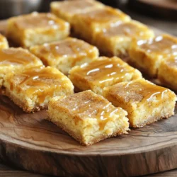 - 1 cup unsalted butter, softened - 1 ½ cups granulated sugar - 1 cup brown sugar, packed - 3 large eggs - 2 teaspoons vanilla extract - 3 cups all-purpose flour - 2 teaspoons cream of tartar - 1 teaspoon baking soda - ½ teaspoon salt - ¼ cup granulated sugar (for sprinkling) - 2 teaspoons ground cinnamon - 1 cup caramel sauce (store-bought or homemade) To make Caramel Snickerdoodle Bars, you need a mix of key ingredients. Start with butter, both granulated and brown sugar. The brown sugar adds richness. You will also need eggs to bind the mix and vanilla for flavor. Next, you’ll need flour, cream of tartar, baking soda, and salt. These dry ingredients help create the soft, chewy texture we love in snickerdoodles. Finally, cinnamon and granulated sugar will give that classic flavor. The star of the show is caramel sauce, which adds sweetness and gooeyness. - Homemade caramel sauce recipe - Nut or chocolate add-ins You can make your caramel sauce for extra flavor. Adding nuts or chocolate can also change the taste. Try pecans for a nice crunch or chocolate chips for sweetness. - 9x13 inch baking pan - Mixing bowls - Electric mixer - Parchment paper Gather these tools to make your baking easier. The electric mixer helps combine the ingredients well, while the baking pan shapes your bars. Lining the pan with parchment paper makes cleanup simple. For the complete recipe, check out the Full Recipe. - Preheat to 350°F (175°C). - Grease or line the baking pan. Start by preheating your oven. This ensures even baking. I use a 9x13 inch baking pan. Greasing it makes it easy to remove the bars later. If you prefer, line it with parchment paper for easy cleanup. - Creaming butters and sugars. - Adding eggs and vanilla. In a large bowl, beat the softened butter with granulated and brown sugars. Mix it until light and fluffy, about 3-4 minutes. Next, add in the eggs, one at a time. Stir in the vanilla extract and mix until combined. This step is key for a rich flavor. - Whisking flour and other dry ingredients. - Incorporating into the wet mixture. In another bowl, whisk together the flour, cream of tartar, baking soda, and salt. This helps to evenly distribute the baking soda. Slowly add this dry mix to your wet ingredients. Mix just until combined. Be careful not to overmix, or the bars will be tough. - Spreading the first batter layer. - Drizzling caramel and adding cinnamon sugar. Pour half of the batter into the prepared pan. Spread it out evenly. Then, drizzle half of the caramel sauce over this layer. Next, sprinkle half of the cinnamon sugar mix on top. This adds a sweet crunch to each bite. - Spreading the top layer of batter. - Baking time and indicators for doneness. Now, spoon the remaining batter over the caramel layer. Spread it gently, then drizzle the rest of the caramel on top. Sprinkle the final bit of cinnamon sugar. Bake in your preheated oven for 25-30 minutes. The edges should be golden brown, and a toothpick should come out mostly clean. You may see some caramel clinging to it, and that’s okay! Enjoy this easy and tasty recipe! For the full recipe, check out the details above. - Avoiding overmixing: Mix just until the ingredients blend. This keeps the bars soft. Overmixing can make them tough. - Ensuring even baking: Rotate your pan halfway through baking. This helps the bars bake evenly. Check for doneness by inserting a toothpick. It should come out mostly clean. - How to serve the bars attractively: Cut the bars into nice squares. Arrange them on a pretty platter. - Drizzling caramel and sprinkling cinnamon: Drizzle extra caramel on top for flair. A sprinkle of cinnamon adds a nice touch. - Underbaking or overbaking: Keep an eye on your oven timer. Underbaking gives gooey centers. Overbaking makes them dry. - Incorrect measurements: Always measure your ingredients carefully. A little too much flour can ruin the texture. Follow the Full Recipe for best results. {{image_2}} You can make your Caramel Snickerdoodle Bars even better with a few tweaks. Adding nuts, like walnuts or pecans, gives a nice crunch. You can also toss in chocolate chips for a sweet surprise. If you want to change the caramel flavor, try using salted caramel for a richer taste. This will add depth and balance to the sweetness. Want to adapt the recipe for your diet? You can make gluten-free bars by swapping all-purpose flour with a gluten-free blend. This keeps the texture nice and chewy. For a vegan option, replace the eggs with flax eggs or applesauce. Use coconut oil instead of butter and choose a vegan caramel. These choices will still yield delicious results! You can change these bars based on the season. In fall, add spices like nutmeg or allspice to give warmth. During the holidays, consider adding peppermint extract or festive sprinkles. These little changes can make your bars feel fresh and exciting year-round. Enjoy the full recipe for more delicious ideas! To store your Caramel Snickerdoodle Bars, let them cool completely. Place the bars in an airtight container. Keep them at room temperature for up to three days. If you want to keep them fresh, add a slice of bread to the container. This helps to retain moisture. For long-term storage, you can freeze the bars. First, wrap each bar tightly in plastic wrap. Then place them in a freezer-safe bag or container. They will stay good for up to three months. When ready to enjoy, simply thaw them overnight in the fridge. To warm the bars, preheat your oven to 350°F (175°C). Place the bars on a baking sheet. Heat them for about 10 minutes. You can also use the microwave; just warm them for 15-20 seconds. Enjoy your warm Caramel Snickerdoodle Bars, drizzled with extra caramel for a special treat! To make Caramel Snickerdoodle Bars, follow these steps: 1. Preheat your oven to 350°F (175°C) and prepare a 9x13 inch baking pan by greasing it or lining it with parchment paper. 2. In a large bowl, cream together 1 cup of softened unsalted butter, 1 ½ cups of granulated sugar, and 1 cup of packed brown sugar until fluffy. 3. Add 3 large eggs one by one, mixing well after each. Stir in 2 teaspoons of vanilla extract. 4. In another bowl, whisk together 3 cups of all-purpose flour, 2 teaspoons of cream of tartar, 1 teaspoon of baking soda, and ½ teaspoon of salt. 5. Mix the dry ingredients into the wet mixture until just combined. 6. Prepare the cinnamon sugar by mixing ¼ cup of granulated sugar and 2 teaspoons of ground cinnamon in a small bowl. 7. Pour half of the batter into the pan, drizzle half of the caramel sauce, and sprinkle half of the cinnamon sugar. 8. Spread the remaining batter over this layer, drizzle with the rest of the caramel, and add the final cinnamon sugar on top. 9. Bake for 25-30 minutes, until golden brown and a toothpick comes out mostly clean. 10. Let the bars cool for 15-20 minutes before slicing. Yes, you can use different types of caramel. Store-bought caramel sauce is easy and quick. You can also make your own for a fresher taste. If you want, try salted caramel for a nice twist. You can even use caramel candies melted down. Just remember, the type of caramel you choose can change the flavor a bit. Caramel Snickerdoodle Bars last for about 4-5 days at room temperature. Keep them in an airtight container to stay fresh. If you see mold or the bars feel dry, they are no longer good. For longer storage, you can freeze them. Yes, you can make gluten-free Caramel Snickerdoodle Bars. Use a gluten-free all-purpose flour blend in place of regular flour. Make sure the blend includes xanthan gum for the right texture. Always check labels on other ingredients to ensure they are gluten-free. For clean cuts, let the bars cool completely. Use a sharp knife or a pizza cutter for even slices. If you wet the knife with hot water, it will help cut through the caramel without sticking. Cutting the bars while they are slightly warm can lead to messy edges. You now know how to make delicious Caramel Snickerdoodle Bars. We covered all the required ingredients, tools, and steps to bake them perfectly. Remember to avoid common mistakes like overmixing and incorrect measurements. Feel free to get creative with flavor variations or dietary adaptations. These bars store well and can be frozen for later enjoyment. Follow these tips for tasty results every time. Enjoy your baking journey and share this sweet treat with others. Happy baking!