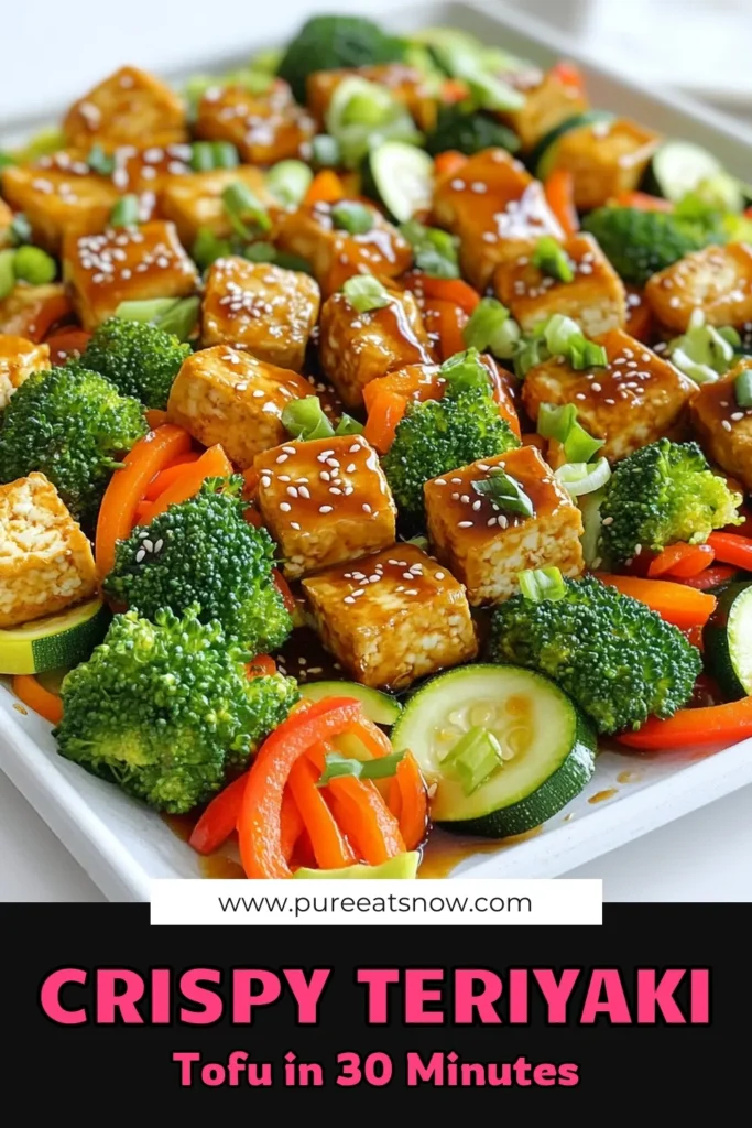 Craving a delicious and healthy meal? Try this Sheet Pan Teriyaki Tofu and Veggies recipe that’s not only simple to make but also packed with flavor! With crisp tofu and colorful vegetables tossed in a homemade teriyaki sauce, it's perfect for busy weeknights. Ready in just 45 minutes, it's a dish the whole family will love. Click to explore this easy recipe! #TeriyakiTofu #HealthyEating #SheetPanRecipes #VegetarianMeals