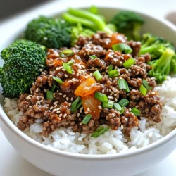 For this tasty dish, you will need: - 1 lb ground beef - 1 tablespoon vegetable oil - 4 cloves garlic, minced - 1 tablespoon ginger, minced - 3 tablespoons gochujang (Korean chili paste) - 2 tablespoons soy sauce - 1 tablespoon sesame oil - 2 tablespoons brown sugar - 1 teaspoon black pepper - 4 green onions, chopped - 1 cup cooked white rice - 1 cup steamed broccoli florets - 1 tablespoon sesame seeds for garnish These key ingredients create a rich flavor and texture. You may already have some of these items at home: - Vegetable oil - Soy sauce - Brown sugar - Black pepper - Sesame oil These staples help build the base of the dish. Feel free to get creative with these extras: - Chopped green onions for garnish - Sesame seeds for a crunchy touch - Sliced cucumbers for a fresh side These garnishes make the bowls look great and add to the taste. First, gather all your ingredients. Measure out 1 pound of ground beef. Next, chop 4 cloves of garlic and 1 tablespoon of ginger. You will also need 3 tablespoons of gochujang, 2 tablespoons of soy sauce, and 1 tablespoon of sesame oil. Then, grab 2 tablespoons of brown sugar and 1 teaspoon of black pepper. Finally, chop 4 green onions and cook 1 cup of white rice and 1 cup of broccoli florets. In a large skillet, heat 1 tablespoon of vegetable oil over medium heat. Add the minced garlic and ginger. Sauté for about 1 minute until you smell the aroma. Next, add the ground beef. Use a spatula to break it apart. Cook it for 5-7 minutes until the beef is brown and no longer pink. Stir in the gochujang, soy sauce, sesame oil, brown sugar, and black pepper. Mix well and cook for another 3-5 minutes. This step allows the beef to soak in all the spicy flavors. Start with a base of cooked white rice in each bowl. Next, scoop the spicy beef mixture on top of the rice. Add the steamed broccoli florets. Drizzle any remaining sauce from the skillet over the top. Finish by sprinkling sesame seeds and any reserved green onions for garnish. Serve each bowl warm and enjoy the wonderful flavors! To make the beef burst with flavor, use quality ground beef. I like 80/20 beef for a nice balance of fat and flavor. Sauté garlic and ginger first to release their aroma. The gochujang is key; it adds heat and depth. Adjust the amount based on your spice level. Mixing in brown sugar helps balance the heat with sweetness. Steam the broccoli just until bright green and tender. Avoid overcooking; it should stay crisp. For a flavorful twist, toss it with a little sesame oil and salt after steaming. You can even sauté it in the beef skillet for added flavor. This way, it absorbs some of the beef juices and sauce. Start with a scoop of warm white rice in each bowl. Add the spicy beef on top, then pile on the broccoli. For extra crunch, add sliced cucumbers. A drizzle of sauce from the skillet makes it more flavorful. Finish with green onions and sesame seeds for a pretty touch! {{image_2}} You can swap ground beef for other proteins. Ground turkey or chicken works great. They keep the dish light and tasty. You might also try diced tofu for a fun texture. If you like seafood, shrimp or fish can add a twist. Just adjust cooking times for these proteins. If you want a vegan version, use lentils or mushrooms. They add protein and a rich flavor. Crumbled tempeh is another excellent choice. It mimics the texture of meat well. Pair it with the same sauce for a delicious meal. Always taste and adjust the spices to your liking. You can change the spice level easily. If you like it mild, cut down on gochujang. Add less for a gentler flavor. Want more heat? Add extra gochujang or some red pepper flakes. Always taste as you go. This will help you find the perfect level for your palate. To keep your spicy Korean beef bowls fresh, store them in an airtight container. Place the beef, rice, and broccoli in the same container. This helps the flavors mix. Make sure to cool the dish to room temperature before sealing. Store in the fridge for up to three days. When you’re ready to enjoy your leftovers, take them out of the fridge. You can reheat them in the microwave for about two minutes. Stir halfway through to heat evenly. If you prefer, you can also reheat on the stove. Just add a splash of water to the pan and heat over low heat until warm. If you want to freeze your spicy Korean beef bowls, it’s best to separate the components. Freeze the beef in one container and the rice and broccoli in another. This way, they stay fresh and tasty. You can freeze them for up to three months. To reheat, thaw overnight in the fridge and then warm as explained above. Gochujang is a spicy Korean chili paste. It has a sweet and savory flavor. You can buy gochujang at most Asian markets. Many grocery stores also have it in the international aisle. Look for a bright red tub or squeeze bottle. Yes, you can use brown rice or other grains. Quinoa or farro work well too. These grains add a nutty flavor to your dish. They may take longer to cook than white rice. These spicy Korean beef bowls last about 3 to 4 days in the fridge. Store them in an airtight container. Keep the beef and rice separate for best results. This helps maintain freshness. Yes, you can make this dish in advance. Cook the beef and rice, then store them separately. You can reheat them when ready to serve. Add fresh toppings like green onions for extra flavor. In this blog post, we explored making Spicy Korean Beef Bowls. We covered the key ingredients, preparation steps, and helpful tips. You learned how to customize the dish with different proteins and spices. Remember to store leftovers properly to enjoy them later. This dish is not only tasty but also flexible and easy to make. Try it out, and you’ll create a dish full of flavor that everyone will love. Enjoy your cooking adventure!