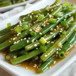 To make Ginger Soy Glazed Green Beans, you need: - 1 lb fresh green beans, trimmed - 2 tablespoons soy sauce - 1 tablespoon fresh ginger, grated - 2 cloves garlic, minced - 1 tablespoon sesame oil - 1 tablespoon honey or maple syrup - 1 teaspoon rice vinegar - 1 teaspoon sesame seeds (for garnish) - 2 green onions, chopped (for garnish) - Salt and pepper to taste These ingredients work together to create a sweet and savory flavor. The fresh ginger and garlic add a nice kick. You can add a few optional ingredients for extra flavor: - Crushed red pepper flakes for heat - Chopped nuts like almonds or peanuts for crunch - A splash of lime juice for brightness These options let you customize the dish to your taste. If you don&rsquo;t have some ingredients, here are great substitutions: - Coconut aminos instead of soy sauce for a gluten-free option - Ground ginger if fresh ginger is not available - Olive oil instead of sesame oil - Maple syrup instead of honey for a vegan option These swaps keep the dish tasty, even if you need to adjust. {{ingredient_image_1}} To start, fill a pot with salted water and bring it to a boil. Once boiling, add 1 pound of fresh green beans that you have trimmed. Cook them for 3 to 4 minutes. They should turn bright green and feel slightly tender. After that, drain the beans and quickly move them to a bowl of ice water. This stops the cooking and keeps the color. After a few minutes, drain the beans again and set them aside. In a small bowl, mix together 2 tablespoons of soy sauce, 1 tablespoon of grated ginger, and 2 cloves of minced garlic. Add 1 tablespoon of sesame oil, 1 tablespoon of honey or maple syrup, and 1 teaspoon of rice vinegar. Whisk it all together until it blends well. This glaze brings a sweet and savory flavor that pairs perfectly with the green beans. Now, heat a large skillet over medium-high heat. Add the blanched green beans to the skillet and saut&eacute; them for 2 to 3 minutes to heat them up. You want them to get a slight char for extra taste. Next, pour the ginger soy glaze over the green beans and toss them well to coat. Cook for another 2 to 3 minutes. This time lets the glaze thicken and stick to the beans. Finally, season with salt and pepper to your taste. When done, remove the skillet from heat. Transfer the beans to a serving dish and sprinkle sesame seeds and chopped green onions on top for garnish. Blanching is key for bright green beans. To start, boil salted water in a pot. Add the green beans and cook for 3-4 minutes. They should be vibrant and slightly tender. Quickly drain the beans. Then, put them in ice water. This stops the cooking. Keeping the beans crisp is important for texture. The glaze must cling to the beans well. Mix soy sauce, ginger, garlic, sesame oil, honey, and rice vinegar in a bowl. Whisk until smooth. When cooking, pour this mix over the heated beans. Let it thicken for 2-3 minutes. The glaze should coat the beans nicely, giving them a shiny look. Garnishes make your dish pop. Use sesame seeds for a nutty crunch. Chopped green onions add color and flavor. You can also try crushed red pepper for heat. These toppings enhance both taste and presentation. Feel free to experiment with your favorite herbs or nuts! Pro Tips Tip Title 1: Blanch the green beans in salted water to enhance their color and flavor. Tip Title 2: For a deeper flavor, let the ginger and garlic saut&eacute; briefly before adding the green beans. Tip Title 3: Adjust the sweetness by varying the amount of honey or maple syrup to your taste. Tip Title 4: Garnish with toasted sesame seeds for an extra crunch and nutty flavor. {{image_2}} You can easily add protein to make this dish heartier. Chicken, shrimp, or tofu work well. Simply cook the protein in the skillet first, then add the green beans. This keeps the flavors rich and tasty. For chicken, cut it into bite-sized pieces. For shrimp, use raw, peeled shrimp. If using tofu, press it to remove moisture, then cube it. Cook until golden before adding the glaze. Feel free to switch out green beans for other veggies. Broccoli, snap peas, or bell peppers all taste great. These options give different textures and flavors. Just remember to blanch the veggies before adding the glaze. This helps keep them bright and crisp. You can mix and match for a colorful dish. If you like heat, add crushed red pepper or sriracha to the glaze. Start with a small amount, then taste it. You can always add more if you want more spice. This change gives the dish a fun kick. It pairs nicely with the sweet and savory notes of the glaze. Adjust the heat to suit your taste. You can store leftover ginger soy glazed green beans in the fridge. Place them in an airtight container. They stay fresh for about 3 to 4 days. If you want to keep them longer, consider freezing instead. Freezing ginger soy glazed green beans is easy. Let the beans cool completely before freezing. Place them in a freezer-safe bag or container. Squeeze out as much air as you can. They can last for up to 3 months in the freezer. When you're ready to use them, just thaw overnight in the fridge. To reheat, you have a few options. You can use the microwave for quick heating. Place the beans in a bowl and cover them to keep moisture. Heat in short bursts until warm. You can also reheat them on the stove. Just add a splash of water and saut&eacute; over medium heat. This method helps keep them tender and tasty. Yes, you can use frozen green beans. They are handy and can save time. Just make sure to thaw them first. Blanching is not necessary, as they are already cooked. Saut&eacute; them in the skillet until heated through. These green beans last for about three to four days in the fridge. Store them in an airtight container to keep them fresh. Reheat them in the microwave or on the stove for best results. Ginger soy glazed green beans pair well with many dishes. They go great with rice or quinoa. You can also serve them alongside grilled chicken or tofu. For a full meal, add a salad or soup to the plate. This blog post covered how to make tasty ginger soy glazed green beans. We discussed the needed ingredients and some optional ones. I shared easy step-by-step instructions for blanching and cooking your green beans. You learned tips for perfecting the glaze and making variations with proteins or other veggies. Finally, we explored storage tips for your leftovers. Try these ideas, and make this dish your own. Enjoy cooking and sharing this delicious meal with friends and family!